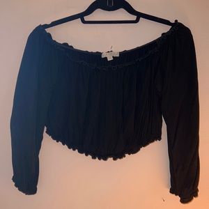 Black off the shoulder crop top with ruffle edges